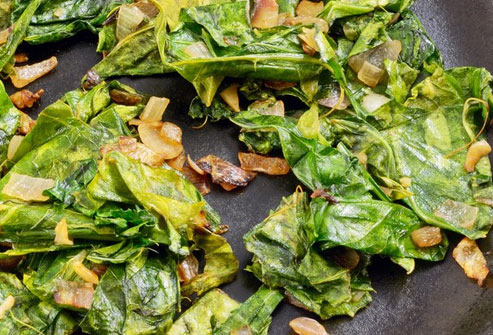Southerners like to cook these slowly in a pot with some kind of meat.