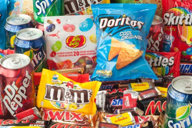 Processed foods like candy bars, cookies, donuts, cake, and soda cause a rapid rise and crash in blood sugar levels, resulting in intense mood swings.