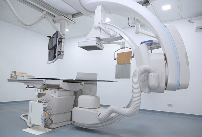 Fluoroscopy can diagnose or aid in diagnosis of many conditions. It refers to using X-rays from a CT scanner to bounce off a mildly radioactive tracer, whether swallowed, administered as an enema or injected into veins. The X-rays make the tracer glow or “fluoresce,” showing the structure and real-time function of the organ or system on a screen.