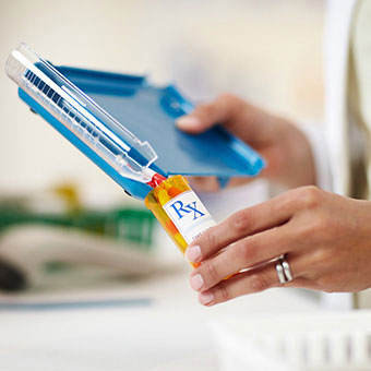 A pharmacist fills a vaginal yeast infection prescription.