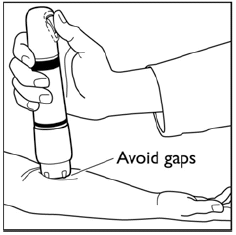 While maintaining downward pressure, administer the dose
by pressing the green start button - Illustration